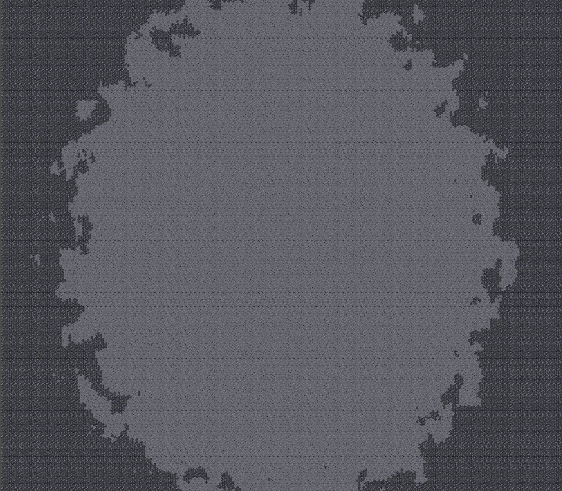 A gif showing a mine being generated from an empty grid to a finished mine, caverns and tunnels carved first, then ore and structures placed.